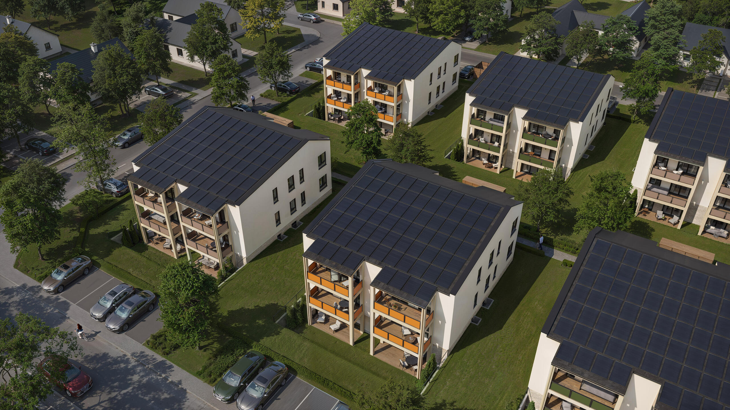 Aerial render of modern residential apartment blocks with balconies and greenery