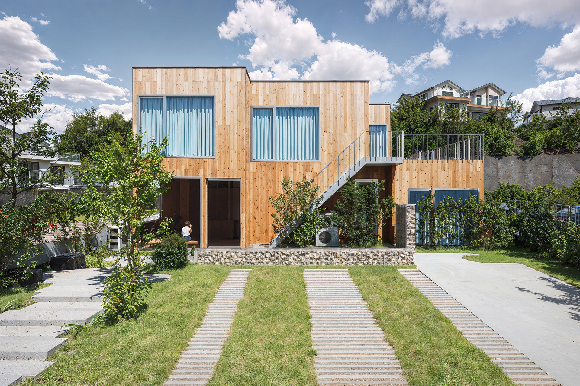 Frontal elevation of dental center 3D visualization Modern dental center with wood-clad facade and private paths - Frontal elevation 3ds Max Visualization